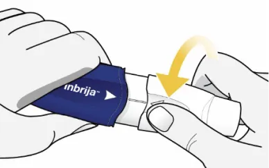 Illustration som visar hur Inbrija-inhalatorn öppnas genom att vrida det vita munstycket nedåt.