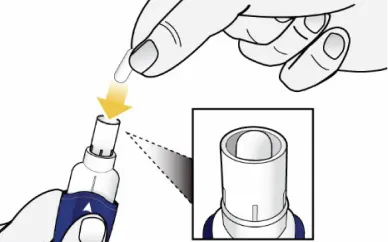 Illustration som visar en kapsel som placeras i inhalatorns kammare, med en närbild av kammarens öppning.